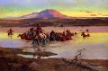 Vadeando la manada de caballos 1900 Charles Marion Russell Indios Americanos